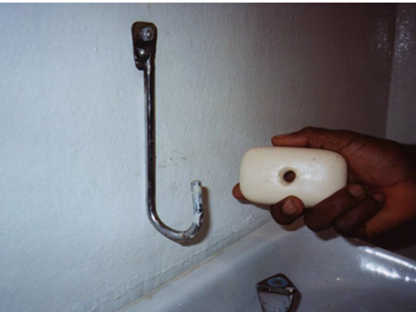 hook and soap in hand